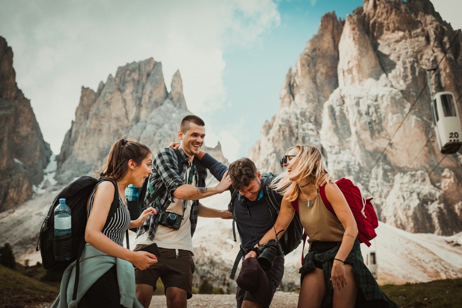 A group of friends laughing together outdoors
